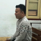 Anggota Bawaslu nonaktif, Azlansyah, menangis saat membacakan pledoi di PN Medan.