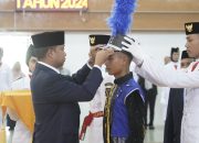 Pj. Walikota Tebing Tinggi Kukuhkan Anggota Paskibraka dan Korps Musik Kota Tebing Tinggi Tahun 2024